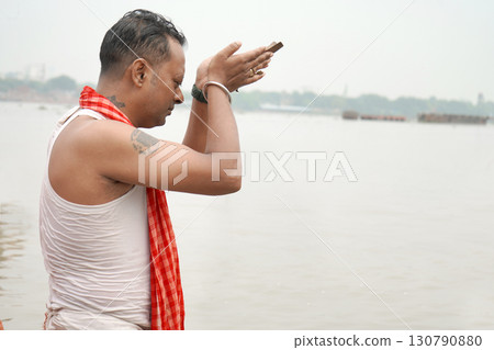 Traditional tarpan ritual in India 130790880