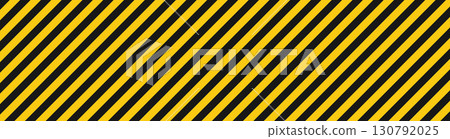 Yellow and black diagonal stripes banner. Abstract warning texture with caution lines pattern. Hazard style backdrop for construction, safety, industrial design, and graphic decoration. 130792025
