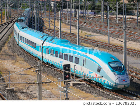 Turkish high-speed train YHT (HT80000 type) entering the station Turkish high-speed train YHT (HT80000 type) entering the station 130792323