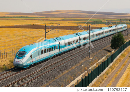 Turkish high-speed train (VelaroTR) running at high speed Turkish high-speed train (VelaroTR) running at high speed 130792327
