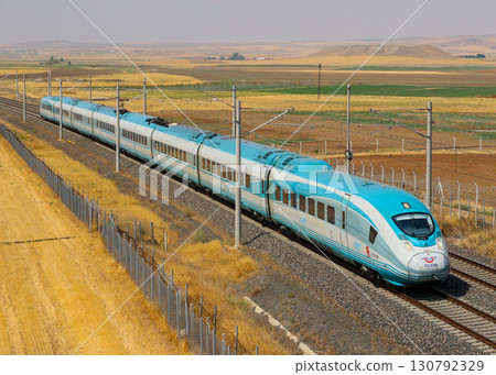 Türkiye's high-speed railway, YHT, runs through the plains Türkiye's high-speed railway, YHT, runs through the plains 130792329