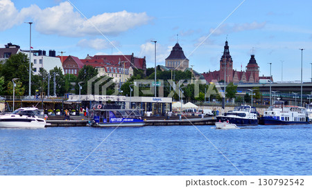 Szczecin, Poland. 16 July 2025. Landscape view and ships and boats on the Odra River Szczecin, Poland. 16 July 2025. Landscape view and ships and boats on the Odra River 130792542