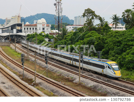 Malaysian Railways Class 93 train departing Ipoh Station Malaysian Railways Class 93 train departing Ipoh Station 130792786