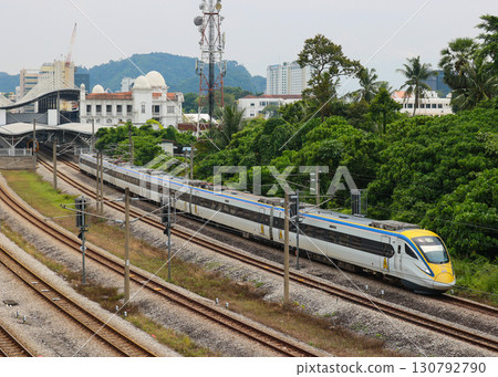 Malaysian Railways Class 93 train departing Ipoh Station Malaysian Railways Class 93 train departing Ipoh Station 130792790