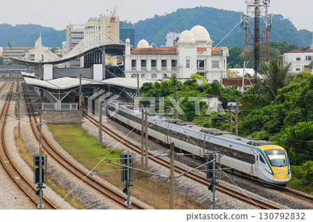 Malaysian Railways Class 93 train departing Ipoh Station Malaysian Railways Class 93 train departing Ipoh Station 130792832