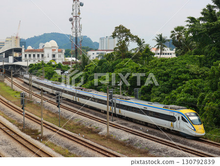 Malaysian Railways Class 93 train departing Ipoh Station Malaysian Railways Class 93 train departing Ipoh Station 130792839