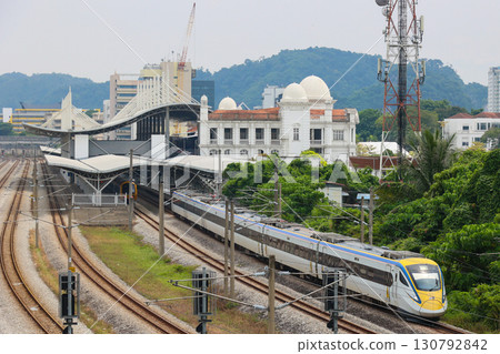 Malaysian Railways Class 93 train departing Ipoh Station Malaysian Railways Class 93 train departing Ipoh Station 130792842