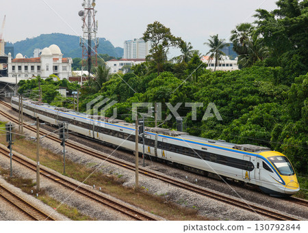 Malaysian Railways Class 93 train departing Ipoh Station Malaysian Railways Class 93 train departing Ipoh Station 130792844
