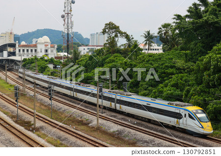 Malaysian Railways Class 93 train departing Ipoh Station Malaysian Railways Class 93 train departing Ipoh Station 130792851