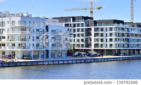 Szczecin, Poland. 16 July 2025. Historical capital of Western Pomerania, lies on the bank of the Odra River. Landscape view on city and the Odra River.  130792886