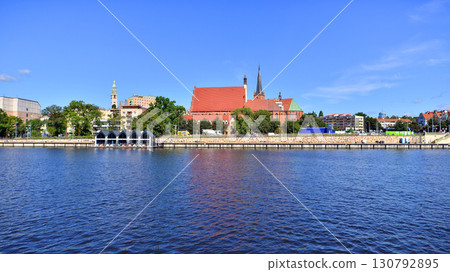 Szczecin, Poland. 16 July 2025. Historical capital of Western Pomerania, lies on the bank of the Odra River. Landscape view on city and the Odra River. Szczecin, Poland. 16 July 2025. Historical capital of Western Pomerania, lies on the bank of the Odra River. Landscape view on city and the Odra River. 130792895