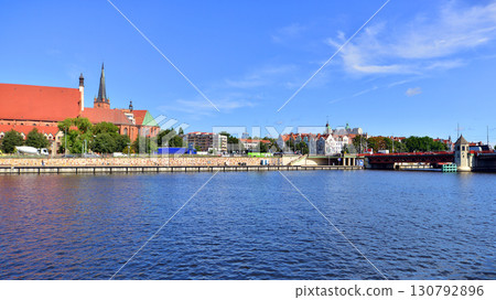 Szczecin, Poland. 16 July 2025. Historical capital of Western Pomerania, lies on the bank of the Odra River. Landscape view on city and the Odra River.  130792896