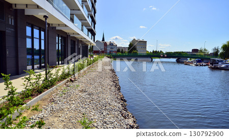 Szczecin, Poland. 16 July 2025. Historical capital of Western Pomerania, lies on the bank of the Odra River. Landscape view on city and the Odra River.  130792900