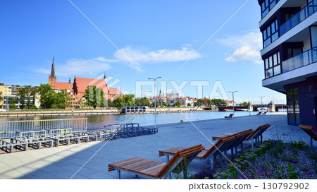 Szczecin, Poland. 16 July 2025. Historical capital of Western Pomerania, lies on the bank of the Odra River. Landscape view on city and the Odra River.  130792902
