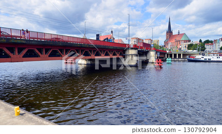 Szczecin, Poland. 16 July 2025. Historical capital of Western Pomerania, lies on the bank of the Odra River. Landscape view on city and the Odra River. Szczecin, Poland. 16 July 2025. Historical capital of Western Pomerania, lies on the bank of the Odra River. Landscape view on city and the Odra River. 130792904