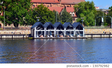 Szczecin, Poland. 16 July 2025. Historical capital of Western Pomerania, lies on the bank of the Odra River. Landscape view on city and the Odra River.  130792982