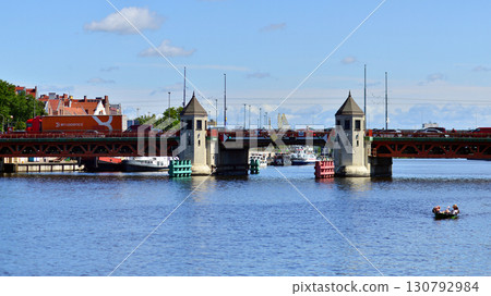 Szczecin, Poland. 16 July 2025. Historical capital of Western Pomerania, lies on the bank of the Odra River. Landscape view on city and the Odra River. Szczecin, Poland. 16 July 2025. Historical capital of Western Pomerania, lies on the bank of the Odra River. Landscape view on city and the Odra River. 130792984
