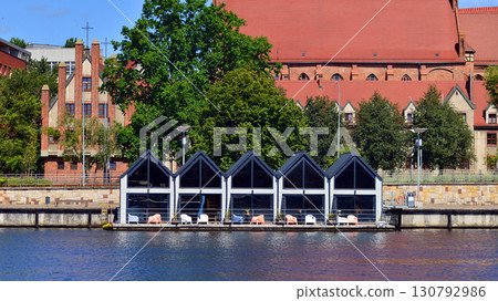 Szczecin, Poland. 16 July 2025. Historical capital of Western Pomerania, lies on the bank of the Odra River. Landscape view on city and the Odra River. Szczecin, Poland. 16 July 2025. Historical capital of Western Pomerania, lies on the bank of the Odra River. Landscape view on city and the Odra River. 130792986