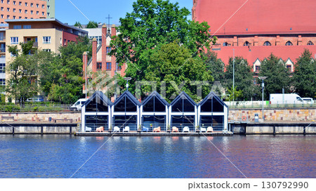 Szczecin, Poland. 16 July 2025. Historical capital of Western Pomerania, lies on the bank of the Odra River. Landscape view on city and the Odra River. Szczecin, Poland. 16 July 2025. Historical capital of Western Pomerania, lies on the bank of the Odra River. Landscape view on city and the Odra River. 130792990