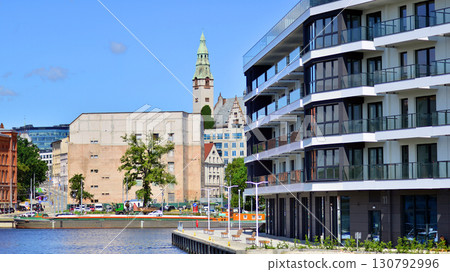 Szczecin, Poland. 16 July 2025. Historical capital of Western Pomerania, lies on the bank of the Odra River. Landscape view on city and the Odra River. Szczecin, Poland. 16 July 2025. Historical capital of Western Pomerania, lies on the bank of the Odra River. Landscape view on city and the Odra River. 130792996