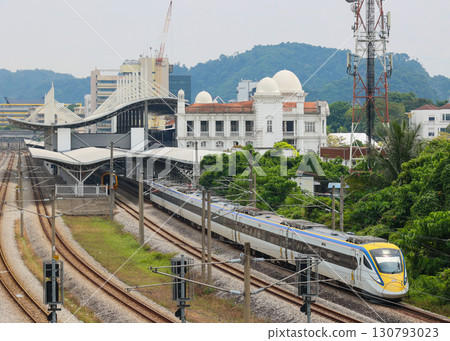 Malaysian Railways Class 93 train departing Ipoh Station Malaysian Railways Class 93 train departing Ipoh Station 130793023