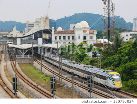 Malaysian Railways Class 93 train departing Ipoh Station Malaysian Railways Class 93 train departing Ipoh Station 130793024
