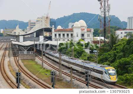 Malaysian Railways Class 93 train departing Ipoh Station Malaysian Railways Class 93 train departing Ipoh Station 130793025