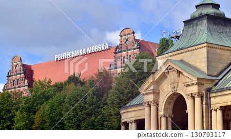 Szczecin, Poland. 16 July 2025. Car traffic at rush hour in downtown area of the city. City center with cars and buildings in the background. Szczecin, Poland. 16 July 2025. Car traffic at rush hour in downtown area of the city. City center with cars and buildings in the background. 130793117