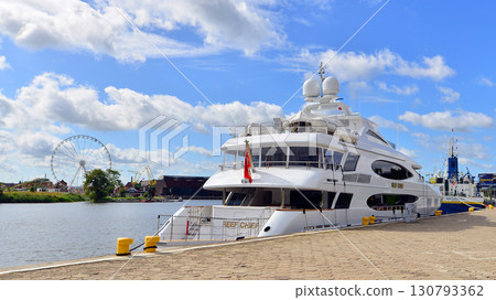 Szczecin, Poland. 16 July 2025. Landscape view and ships and boats on the Odra River. Luxury motor yacht Reef Chief. 130793362