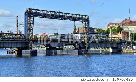 Szczecin, Poland. 16 July 2025. Railway bridge over the Odra River 130793489