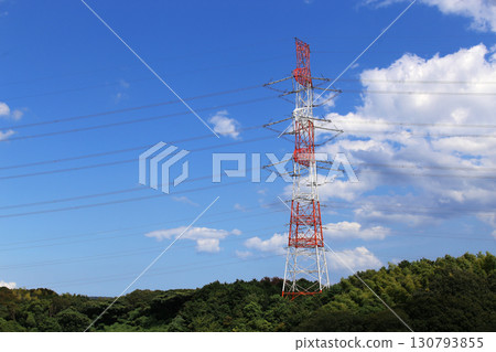Transmission lines that carry large amounts of electricity from power plants to substations and consumption areas Transmission lines that carry large amounts of electricity from power plants to substations and consumption areas 130793855