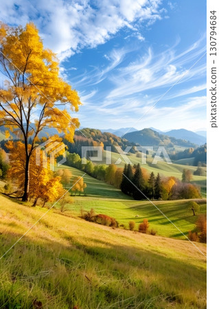 Rolling hills and colorful trees creating breathtaking autumn landscape 130794684