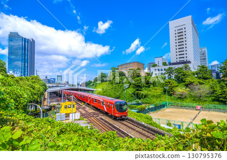 Tokyo cityscape in Japan, including the new 2000 series trains on the Tokyo Metro Marunouchi Line leaving Yotsuya Station 130795376
