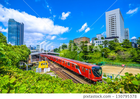 Tokyo cityscape in Japan, including the new 2000 series trains on the Tokyo Metro Marunouchi Line leaving Yotsuya Station 130795378