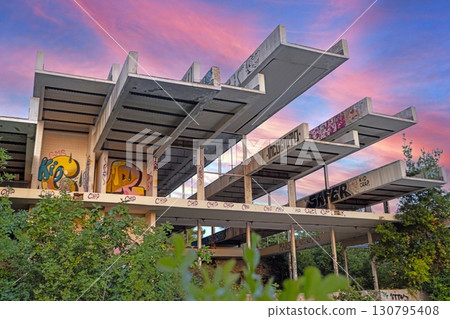 Sunset over ruined outdoor pools at Haludovo Palace Hotel Krk Croatia Sunset over ruined outdoor pools at Haludovo Palace Hotel Krk Croatia 130795408