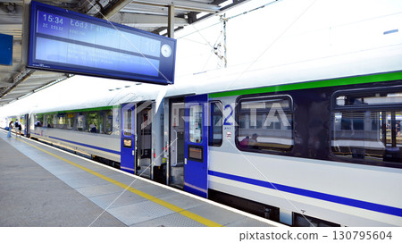 Warsaw, Poland. 15 July 2025. The intercity train stands at the railway station Warsaw, Poland. 15 July 2025. The intercity train stands at the railway station 130795604
