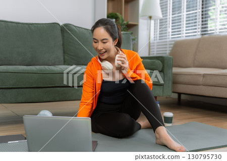 itness ,workout, home exercise ,lifestyle and healthy concept.Woman in exercise gear. itness ,workout, home exercise ,lifestyle and healthy concept.Woman in exercise gear. 130795730