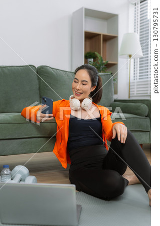 itness ,workout, home exercise ,lifestyle and healthy concept.Woman in exercise gear. itness ,workout, home exercise ,lifestyle and healthy concept.Woman in exercise gear. 130795731