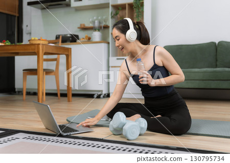 itness ,workout, home exercise ,lifestyle and healthy concept.Woman in exercise gear. itness ,workout, home exercise ,lifestyle and healthy concept.Woman in exercise gear. 130795734