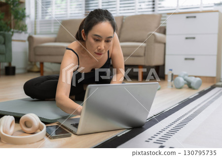 itness ,workout, home exercise ,lifestyle and healthy concept.Woman in exercise gear. itness ,workout, home exercise ,lifestyle and healthy concept.Woman in exercise gear. 130795735