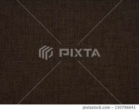 A tapestry of chestnut and sepia tones weaves across the textured expanse of this intriguing paper surface A tapestry of chestnut and sepia tones weaves across the textured expanse of this intriguing paper surface 130796641