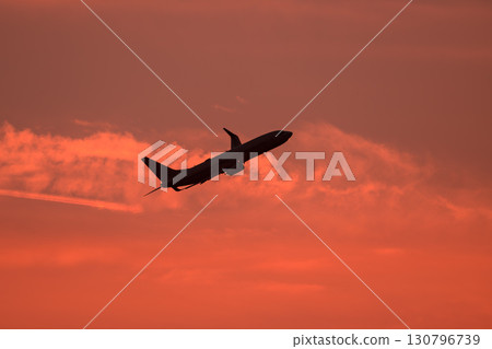 Airplane background, clouds of various expressions, sky, sun, evening sky, sunrise Airplane background, clouds of various expressions, sky, sun, evening sky, sunrise 130796739