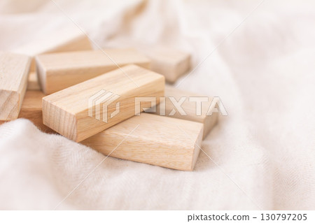 A photo of insect repellent blocks made from camphor wood and clothing A photo of insect repellent blocks made from camphor wood and clothing 130797205