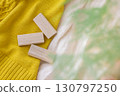 A photo of insect repellent blocks made from camphor trees, clothes, and leaves used for changing clothes 130797250