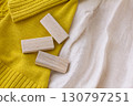 A photo of insect repellent blocks made from camphor trees, clothes, and leaves used for changing clothes 130797251