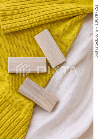 A photo of insect repellent blocks made from camphor wood and clothing A photo of insect repellent blocks made from camphor wood and clothing 130797252