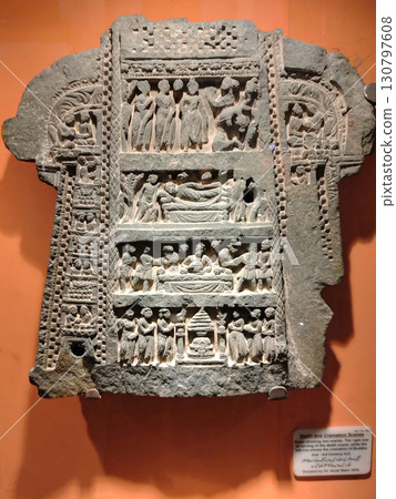 The final scene of Buddha's death on display at the Peshawar Museum in Peshawar, Pakistan, a strategic location in Gandhara. 130797608