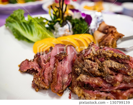 Sliced German Pork Knuckle in plate 130799139