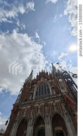 Gothic-style cathedral with intricate stone carvings and tall spires reaching toward the sky 130800800