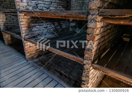 Auschwitz Birkenau Concentration and Extermination Camp. stone bed Auschwitz Birkenau Concentration and Extermination Camp. stone bed 130800926